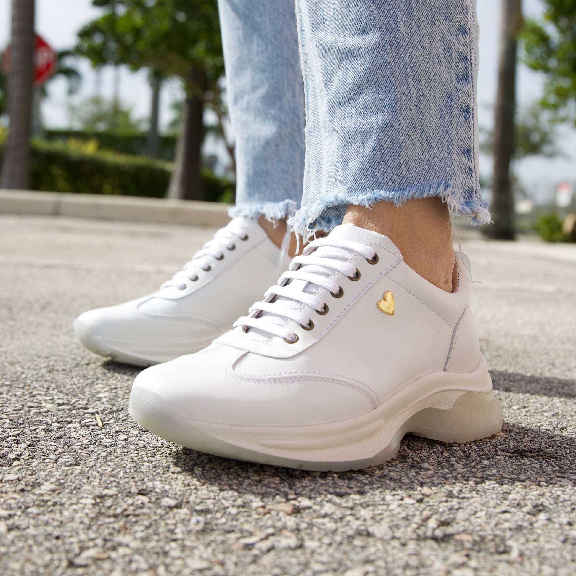 Ayra Sneakers - White by Nataly Mendez, Genuine leather upper material Genuine leather insole lining Rubber platform lining Flexible rubber outsole Handcrafted 1.5 inch heel height 1 inch platform