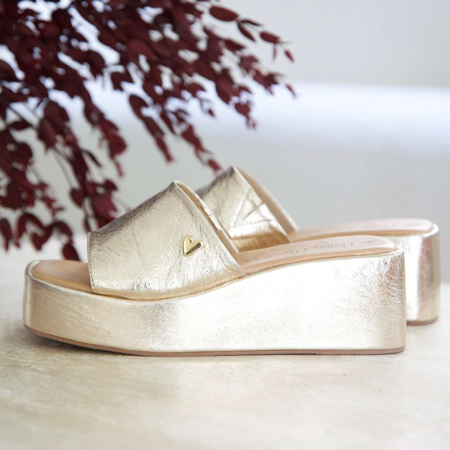 Beth Sandals - Gold by Nataly Mendez, Genuine leather upper material Genuine leather insole lining Hand made 2.5 inch heel height 1.2 inch platform Wide band upper Open toe Slide style