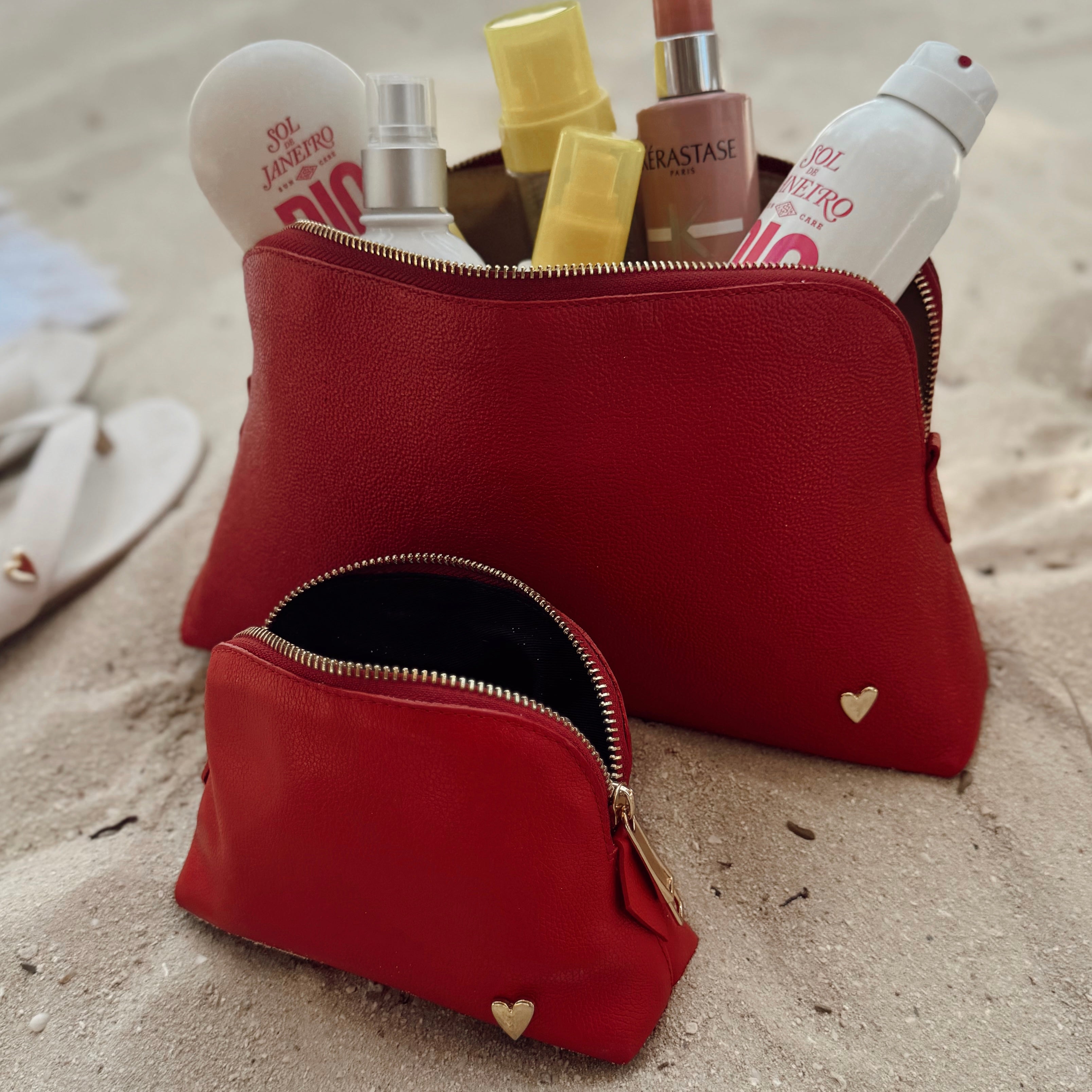 Cosmetic Bag - Red [ Small ] by Nataly Mendez, El portacosméticos no incluye los productos de la imagen. Genuine Leather Signature Heart Interior pocket Designed to stand in their own 4.5" H, 6.5" W, 2" D