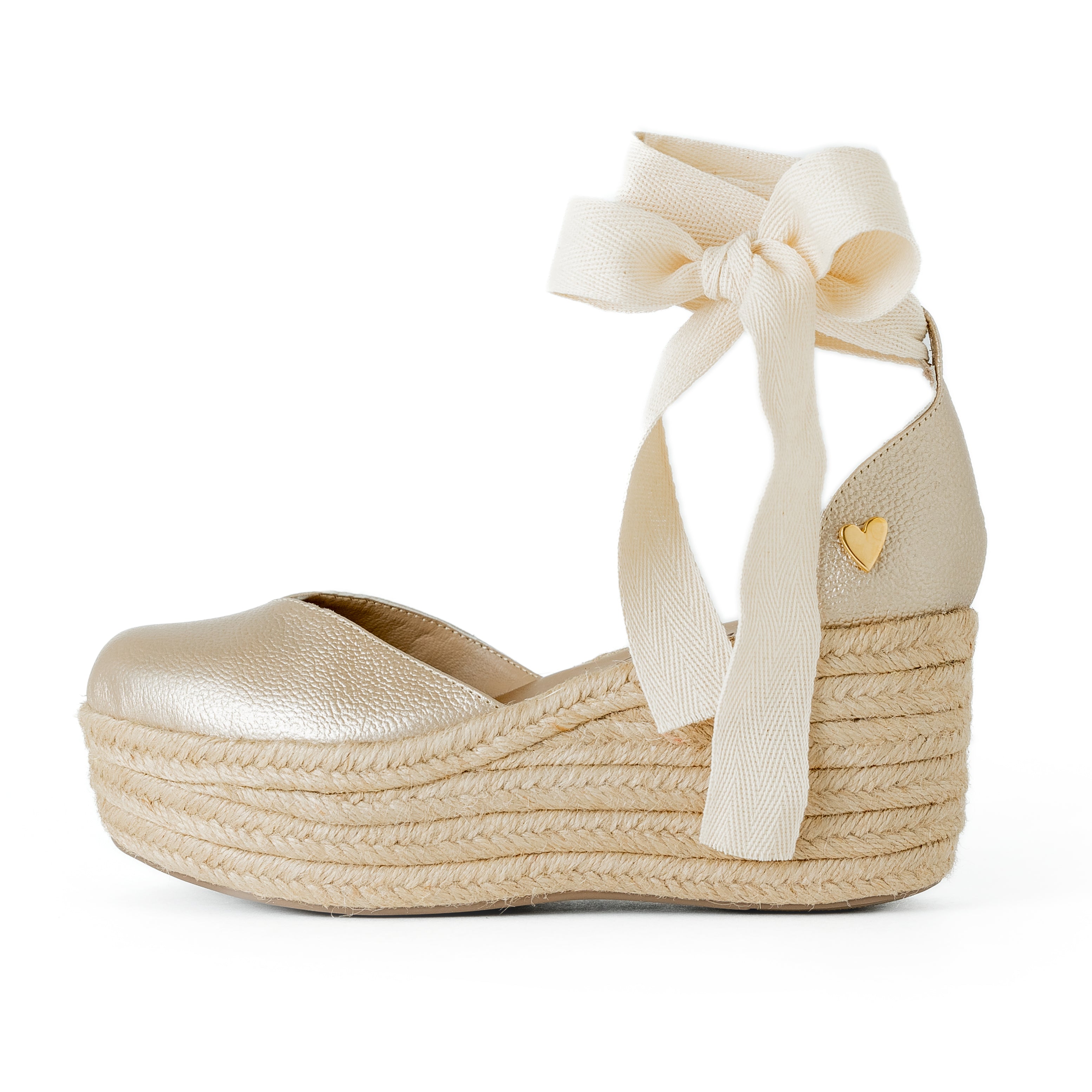 Gold Leather Espadrilles  - Low High by Nataly Mendez, Natural jute base Genuine leather upper Genuine leather insole. 100% made in Colombia! 3 inch heel height 1.75 inch platform Comes with strap closure and beige hiladilla laces.