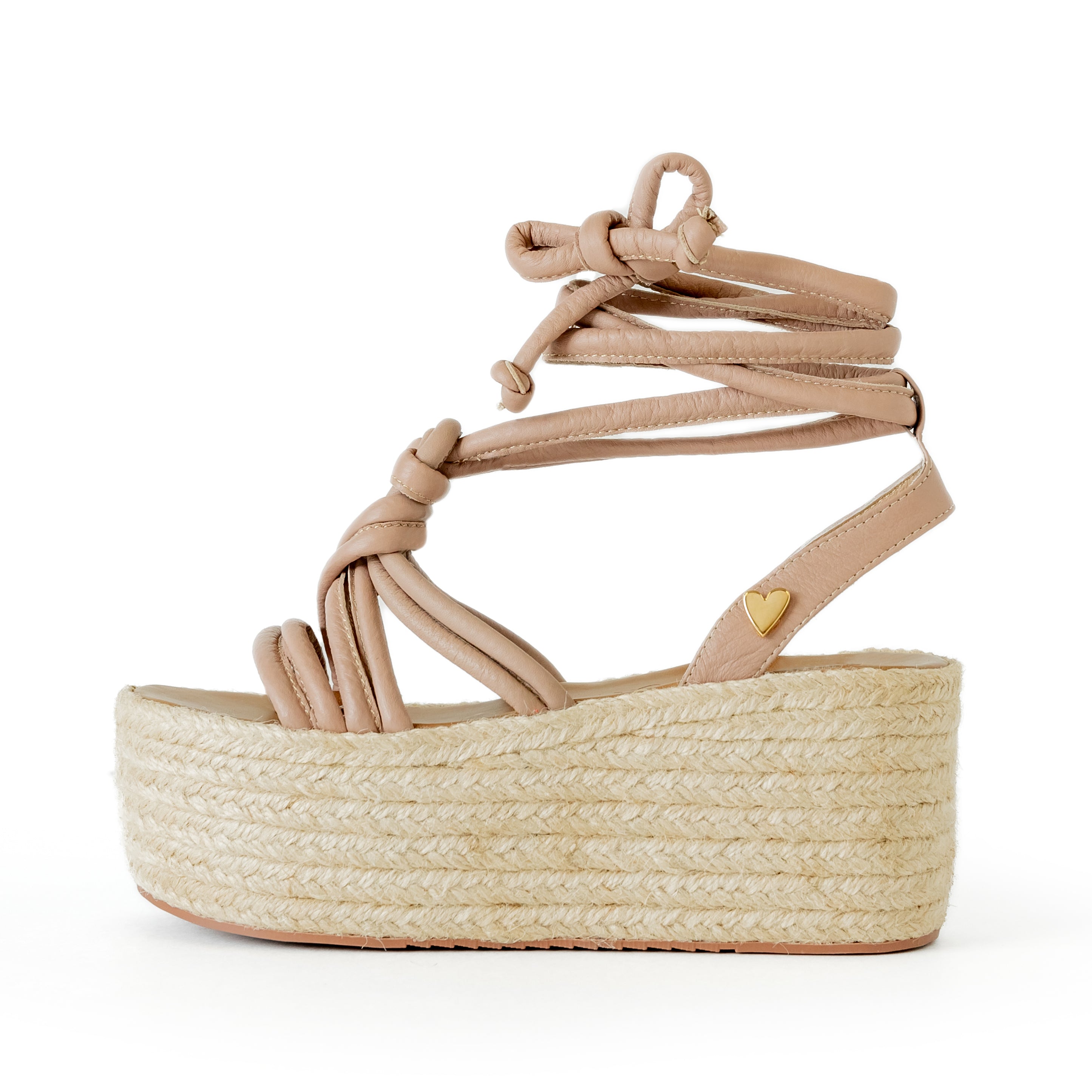 Kassy Taupe by Nataly Mendez Its base is lined with natural jute Green genuine leather upper Adjustable straps Genuine Leather Handmade 3-inch heel height 2.5 inch platform