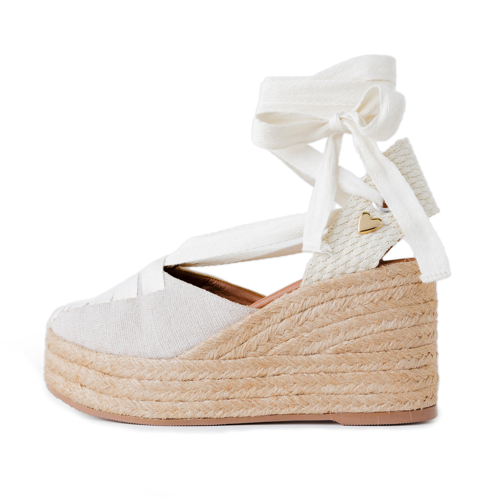 Leah Espadrilles - Sand Beige by Nataly Mendez, Fabric upper material, Genuine leather insole
Flexible rubber sole, Lace up style
3.5 inch high heel, 1 inch platform