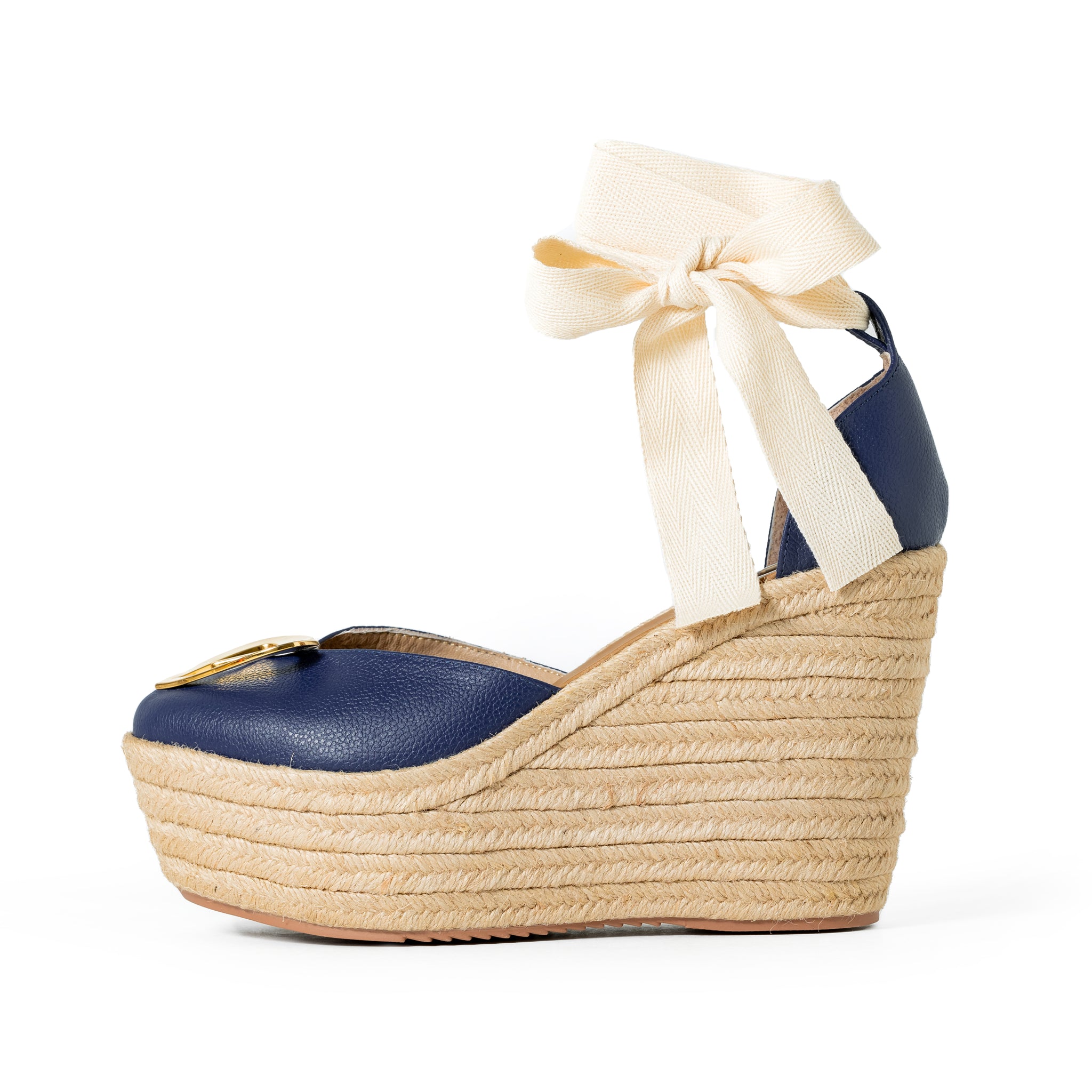 Love Blue Espadrilles by Nataly Mendez, Natural jute base Genuine leather upper Genuine leather insole. 100% made in Colombia! 4 inch heel height 1.75 inch platform Comes with strap closure and beige hiladilla laces.