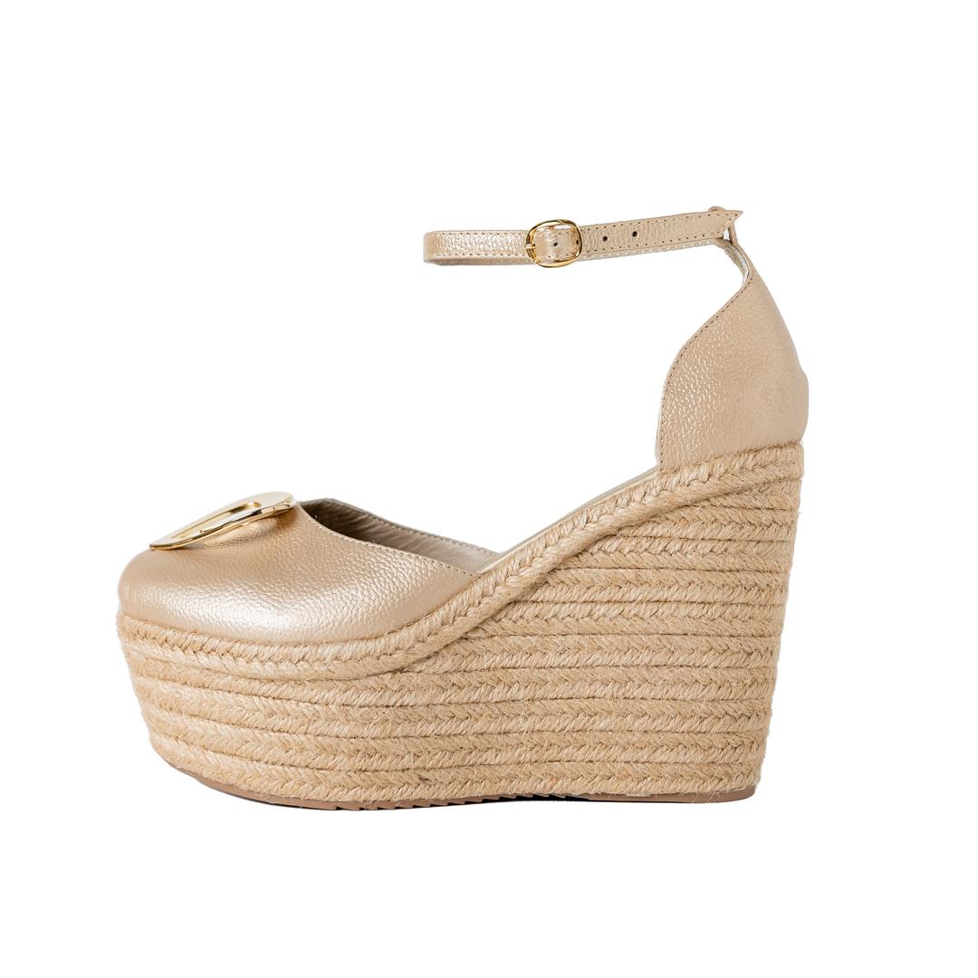 Love Espadrilles - Gold Dual by Nataly Mendez, Natural jute base Genuine leather upper Genuine leather insole. 100% made in Colombia! 4 inch heel height 1.75 inch platform Comes with strap closure and beige hiladilla laces.