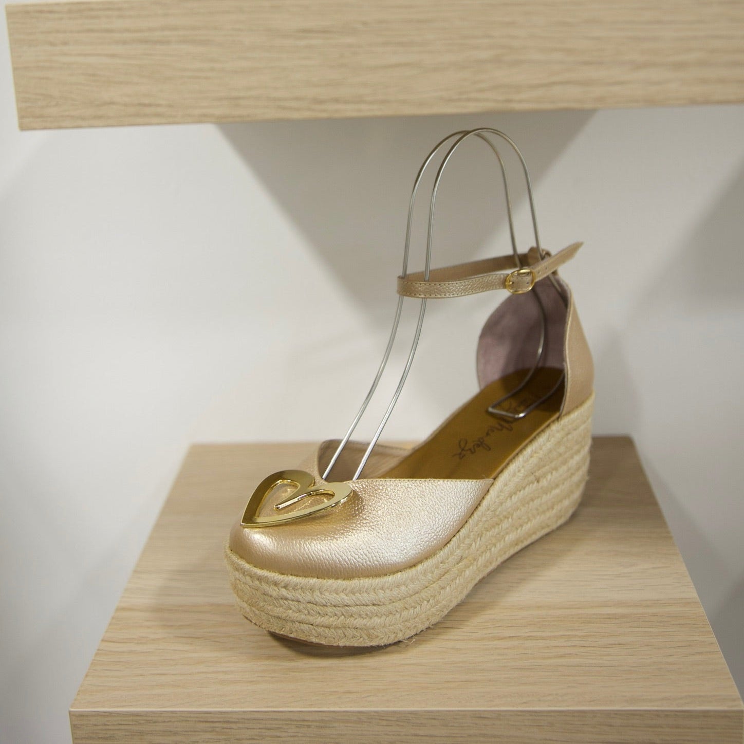 Love Gold Espadrilles - Low High by Nataly Mendez, Natural jute base Genuine leather upper Genuine leather insole. 100% made in Colombia! 3 inch heel height 1.75 inch platform Comes with strap closure and beige hiladilla laces.