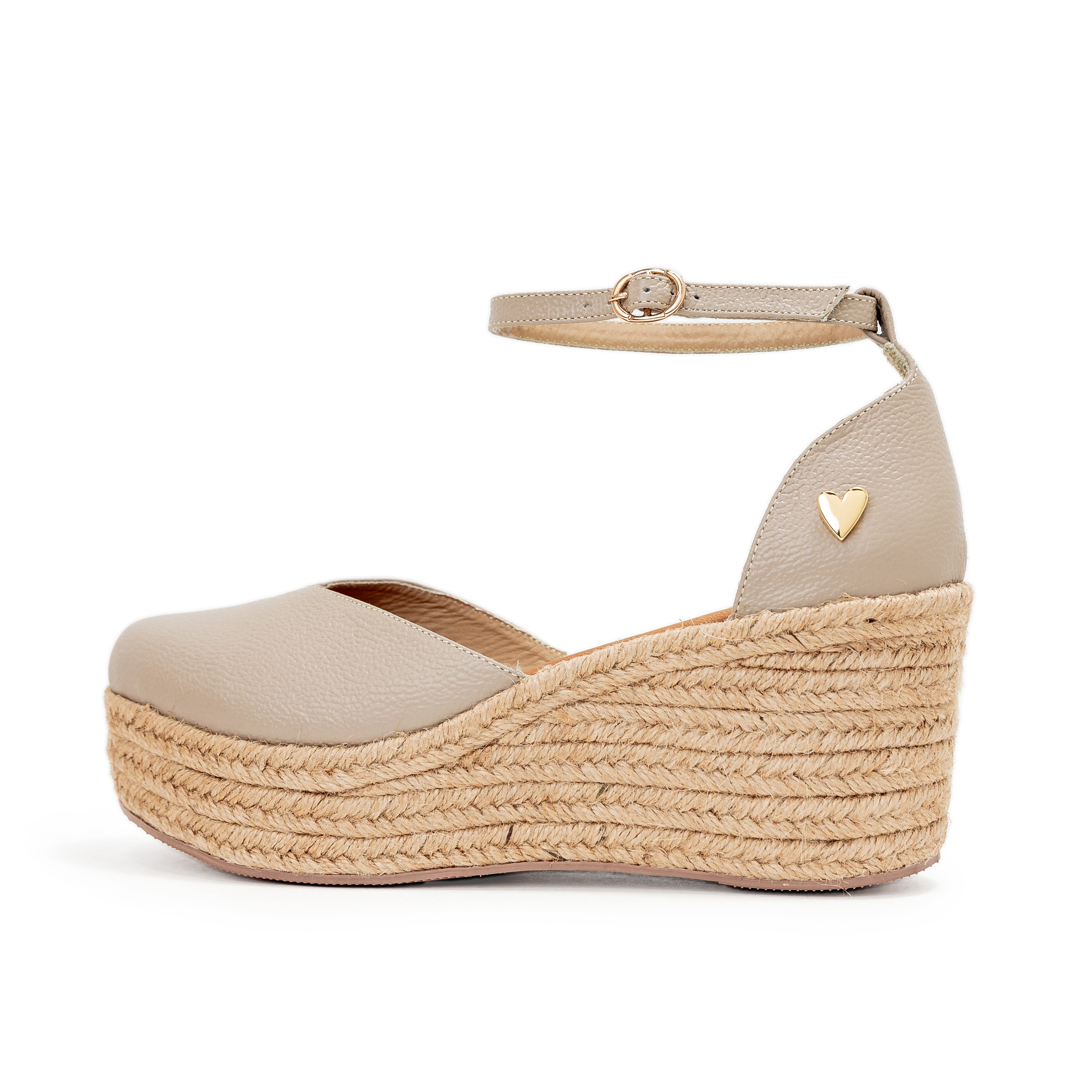 Nude Leather Espadrilles - Low High by Nataly Mendez, Natural jute base Genuine leather upper Genuine leather insole. 100% made in Colombia! 3 inch heel height 1.75 inch platform Comes with strap closure and beige hiladilla laces.