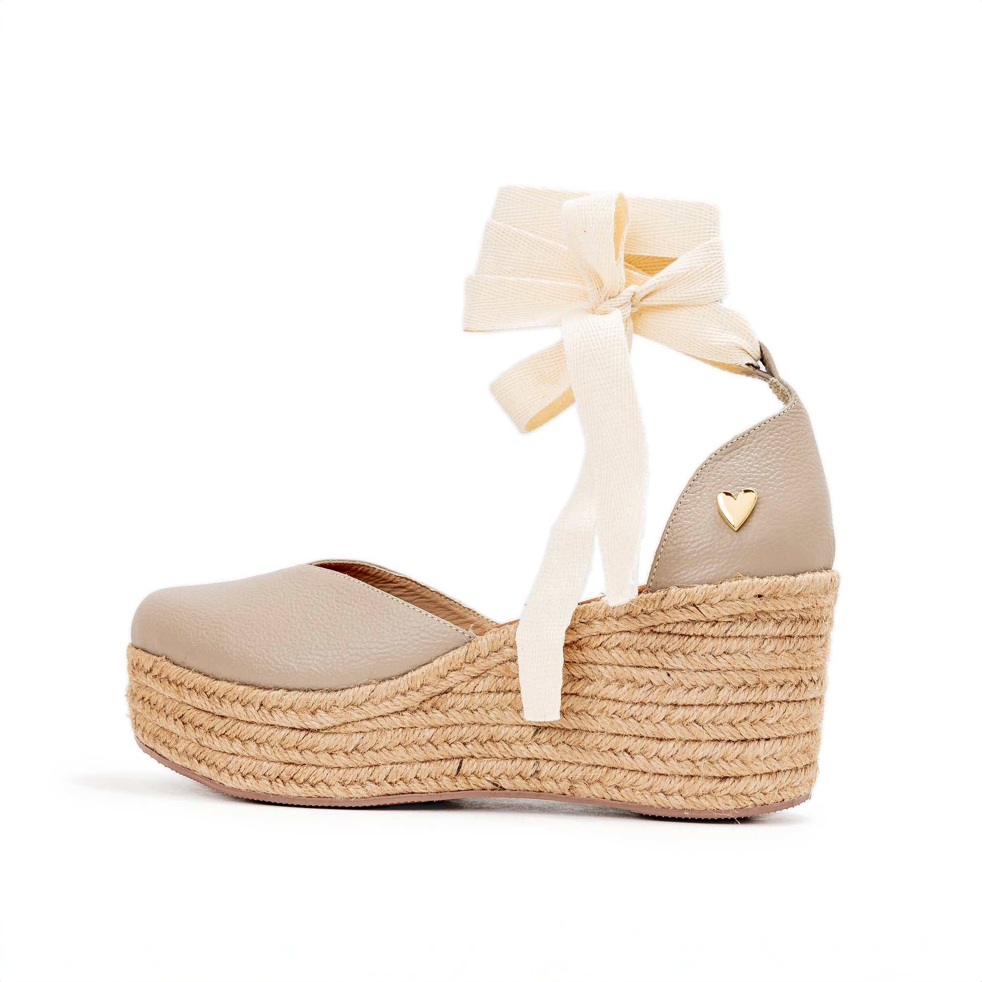 Nude Leather Espadrilles  - Low High by Nataly Mendez, Natural jute base Genuine leather upper Genuine leather insole. 100% made in Colombia! 3 inch heel height 1.75 inch platform Comes with strap closure and beige hiladilla laces.