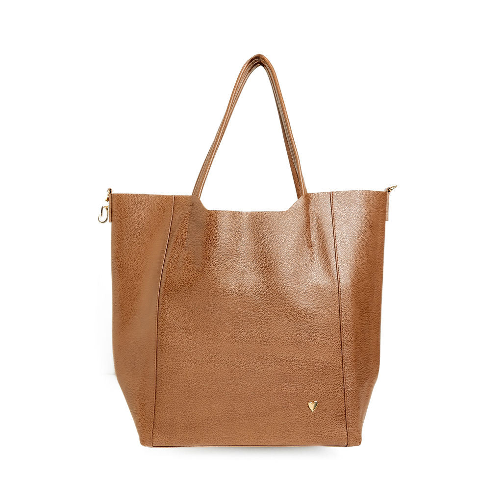 Parker Tote Leather Bag - Brown by Nataly Mendez, Genuine leather 21" H, 6.5" D Top: 9.5" W, Bottom: 13" W Handle Drop: 8.5"; Hook closure Flat zipped inside pocket Gold-color hardware Gold heart