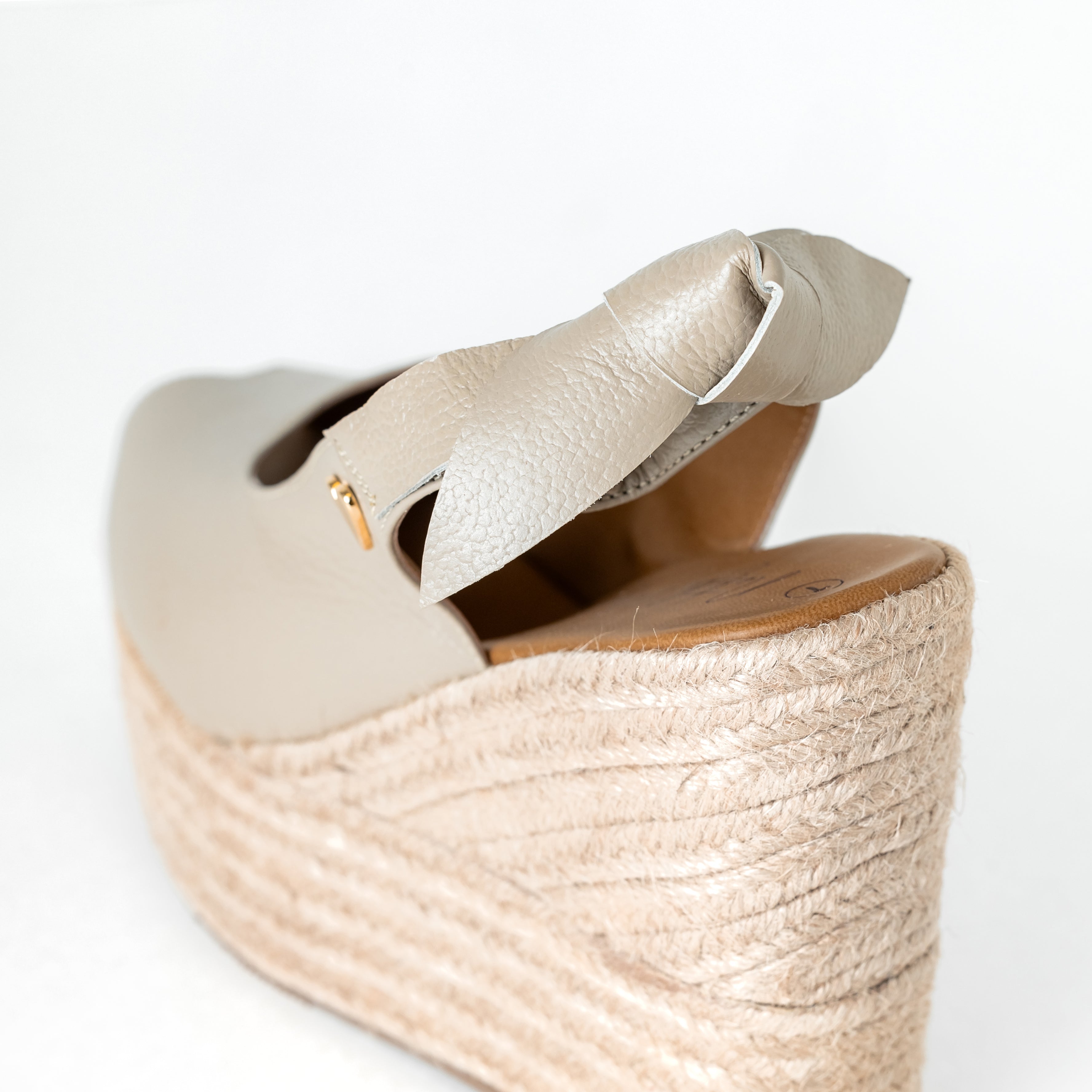 Peep Toe Taupe Espadrilles - Low High by Nataly Mendez, Natural jute base Genuine leather upper Genuine leather insole. 3.5 inch heel height 2 inch platformNatural jute base Genuine leather upper Genuine leather insole. 3.5 inch heel height 2 inch platform