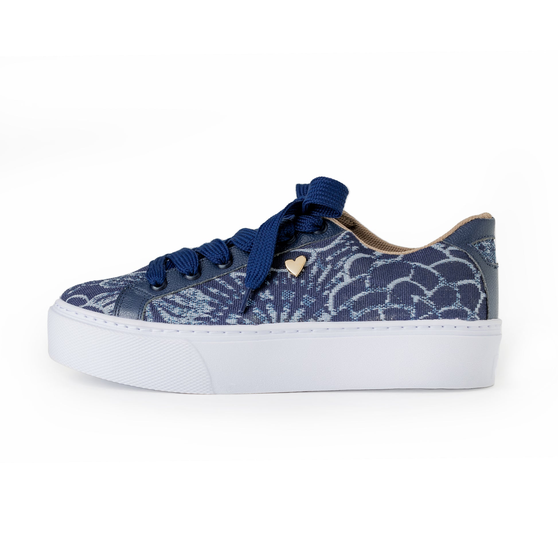Our classic CARMINA sneakers design but now renewed with a blue floral print, ready to be part of your collection. It was inspired by women who need to feel comfortable in their days. FEATURES Fabric upper material Genuine leather insole lining Rubber platform lining American sizes Flexible rubber outsole Handcrafted 1.5 inch heel height 1 inch platform