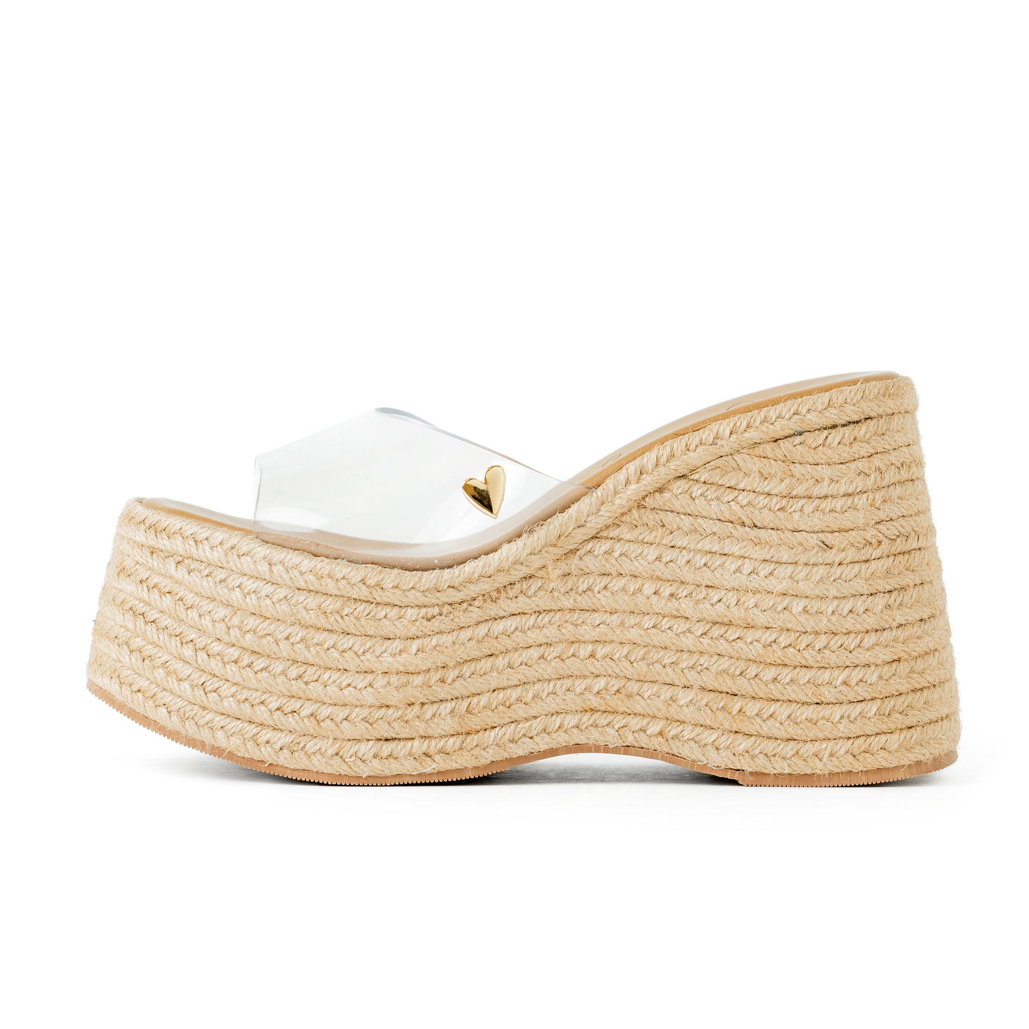 Emma Espadrilles by Nataly Mendez FEATURES  Squared tip Vinyl upper material Genuine leather insole lining Flexible rubber sole Handmade 4.5 inch high heel 2.4 inch platform