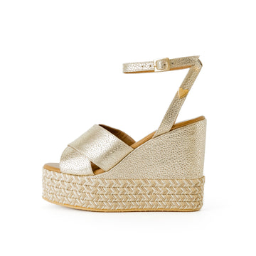 Masha Gold Sandals by Nataly Mendez FEATURES  Genuine leather upper material Genuine leather insole lining Flexible rubber sole Handmade 4.75 inch high heel 1.5 inch platform
