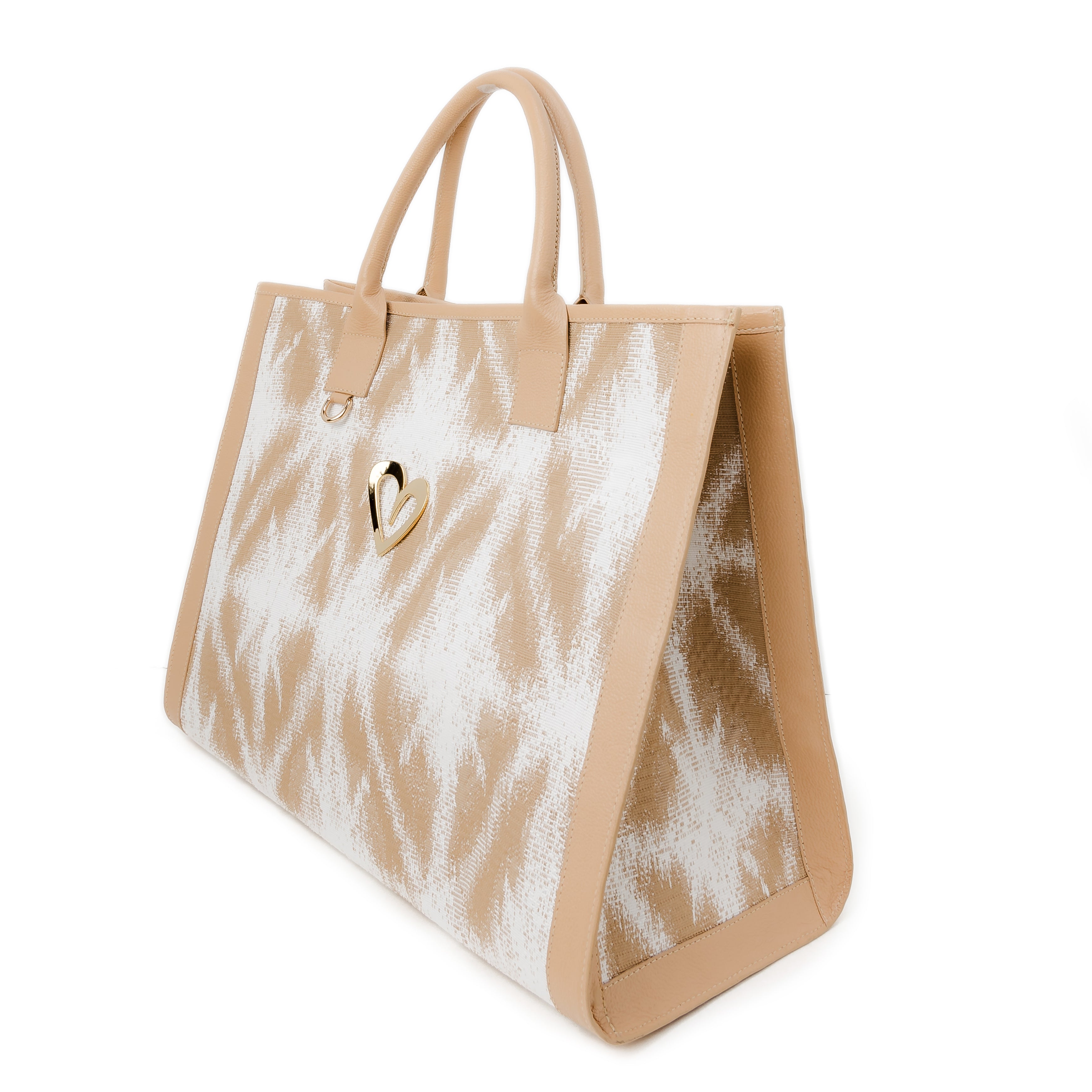 Sienna Beige Tote Bag by Nataly Mendez Genuine leather, Fabric lining, 16 x 12 x 7.5 inches (Length x Height x Width), Magnetic snap closure, Two inside pockets, Built in ring to attach a zippy coin, keychain or hand sanitizer Gold heart