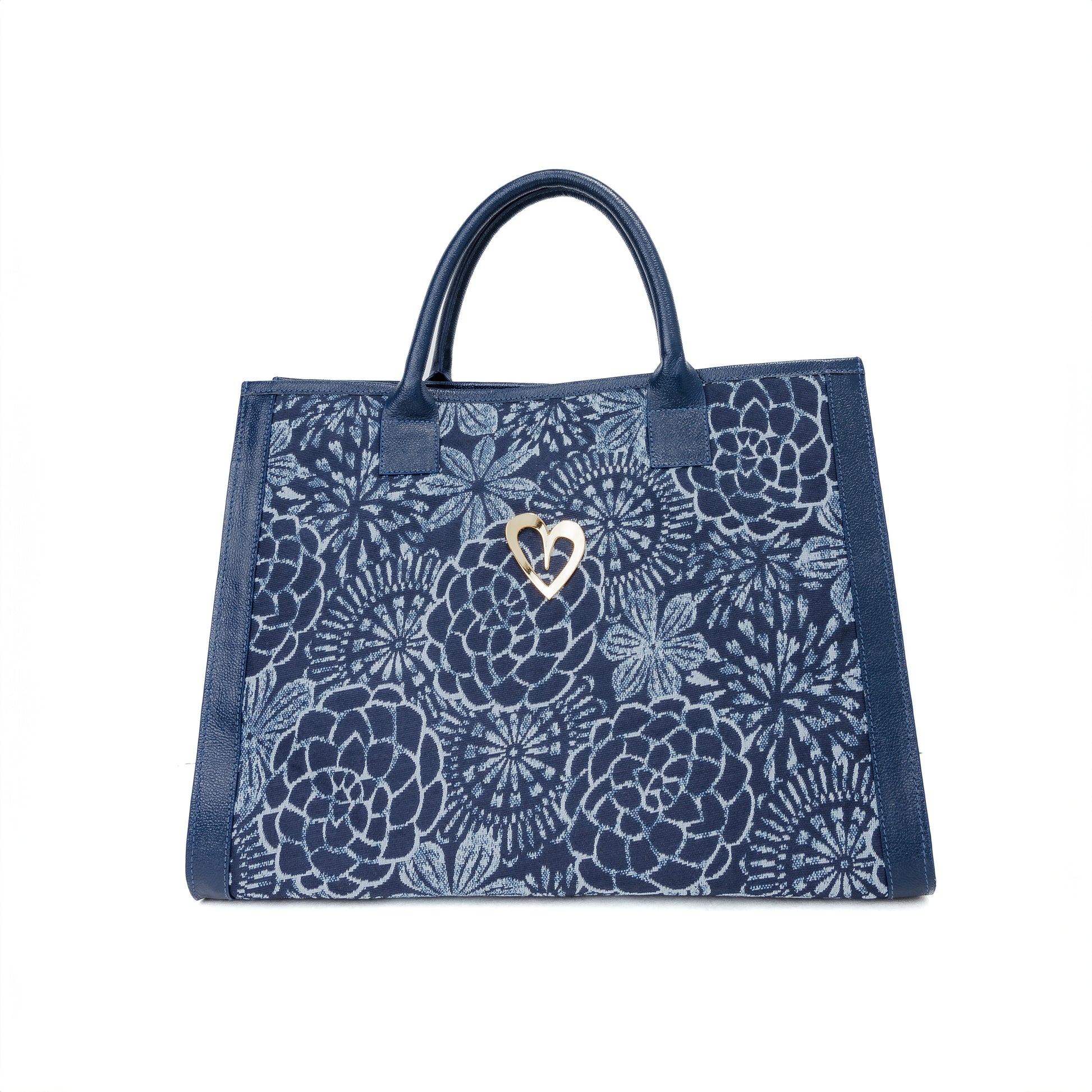 Sienna Tote Bag - Blue Flowers by Nataly Mendez, Genuine leather Fabric lining 16 x 12 x 7.5 inches (Length x Height x Width)  Handle Drop: 6"&nbsp; Magnetic snap closure Two inside pockets Gold heart