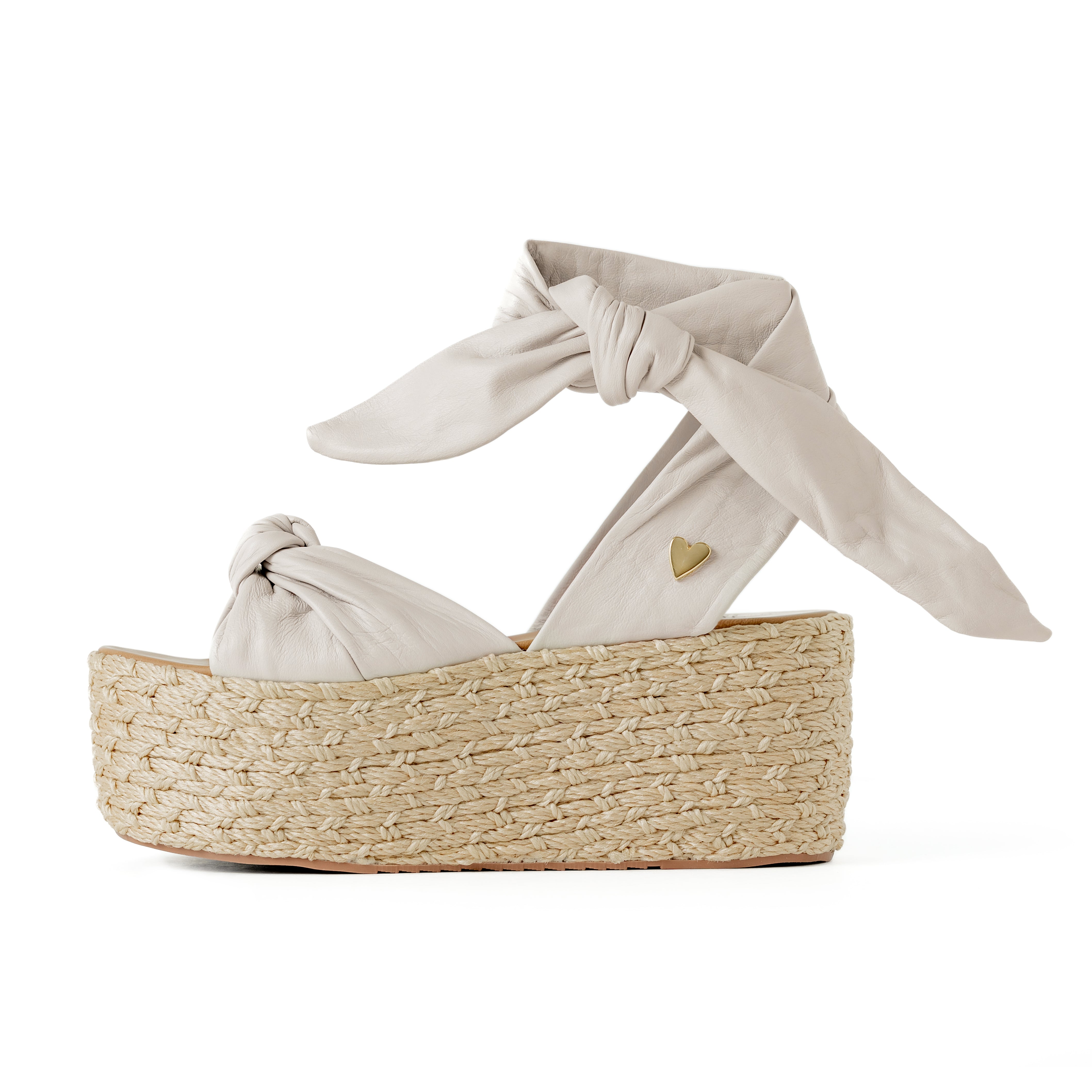 Sisi Espadrilles - Bone Ivory by Nataly Mendez, Its base is lined with natural jute Genuine leather upper material Adjustable straps Genuine Leather insole lining Handmade 3-inch heel height 2.5 inch platform