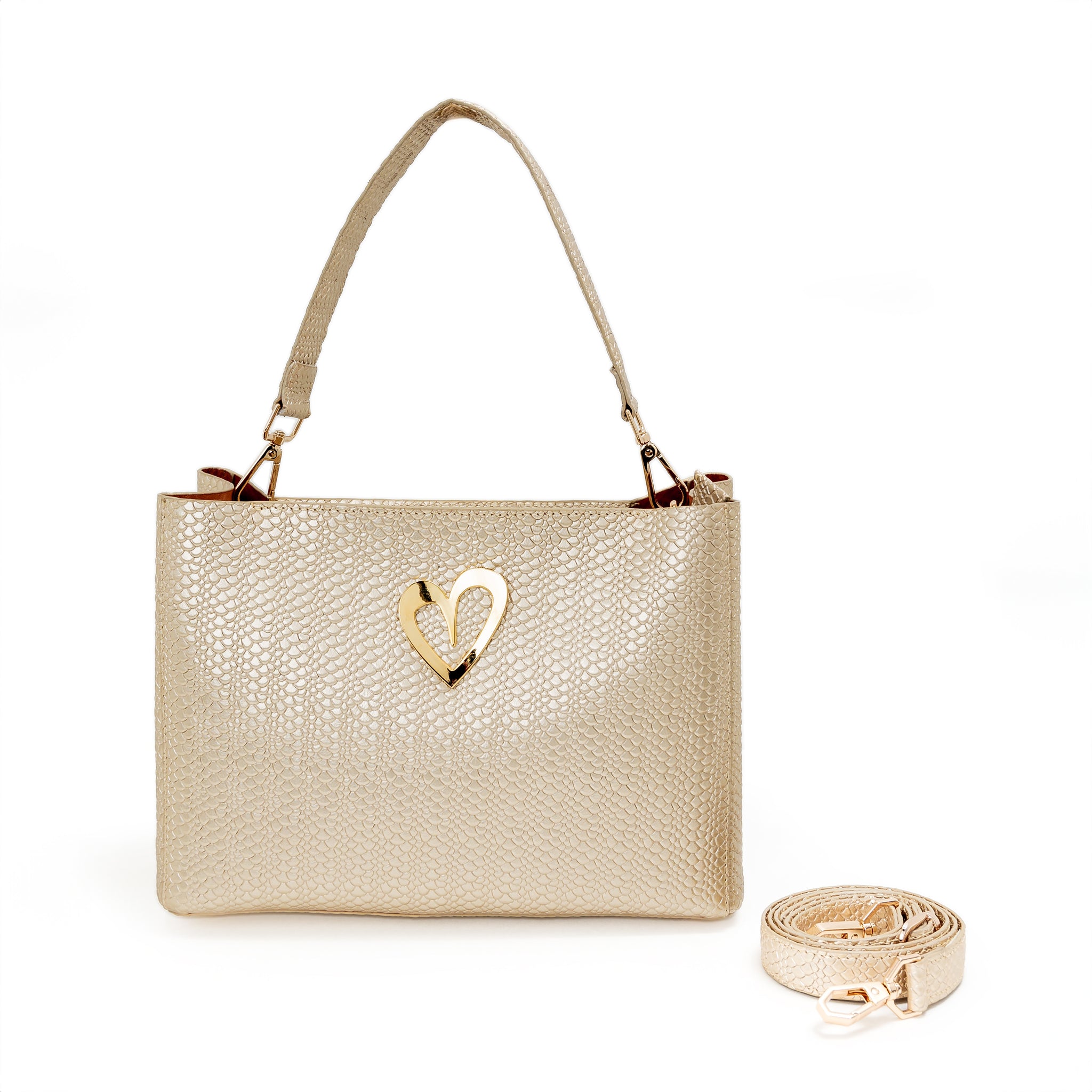 Theresa Dual Bag - Gold by Nataly Mendez, Genuine Leather Adjustable Drop in top zip closure 25 CM x 20 CM x 10 CM Gold Heart Incluye strap corto de mano y strap largo.