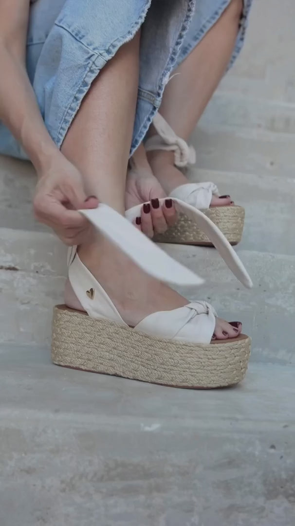 Sisi Espadrilles - Bone Ivory by Nataly Mendez, Its base is lined with natural jute Genuine leather upper material Adjustable straps Genuine Leather insole lining Handmade 3-inch heel height 2.5 inch platform