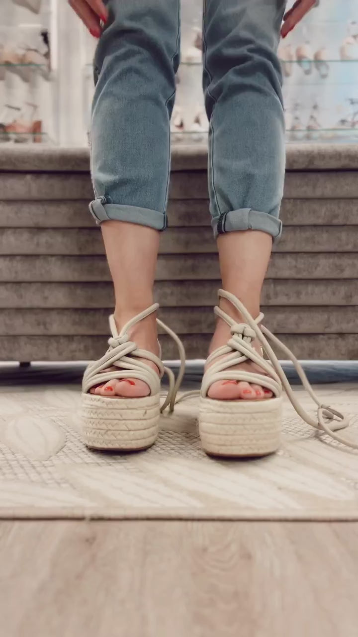 Kassy Marshmallow by Nataly Mendez Its base is lined with natural jute Green genuine leather upper Adjustable straps Genuine Leather Handmade 3-inch heel height 2.5 inch platform