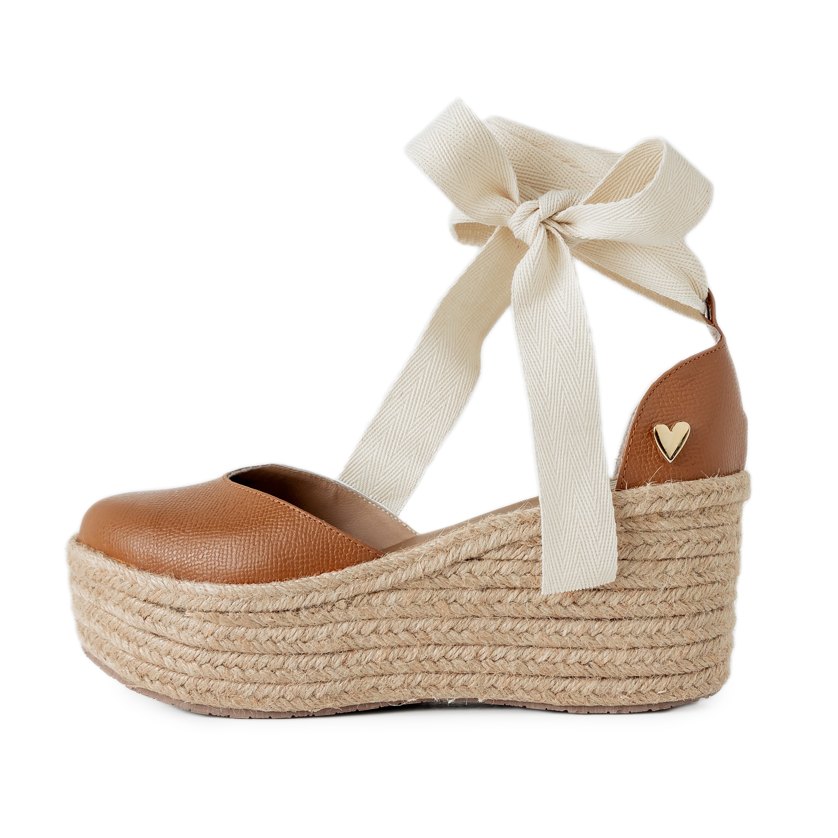 Camel Leather Espadrilles - Low High by Nataly Mendez Natural jute base Genuine leather upper Genuine leather insole. Dual design (includes strap and lace) 3 inch heel height 1.75 inch platform