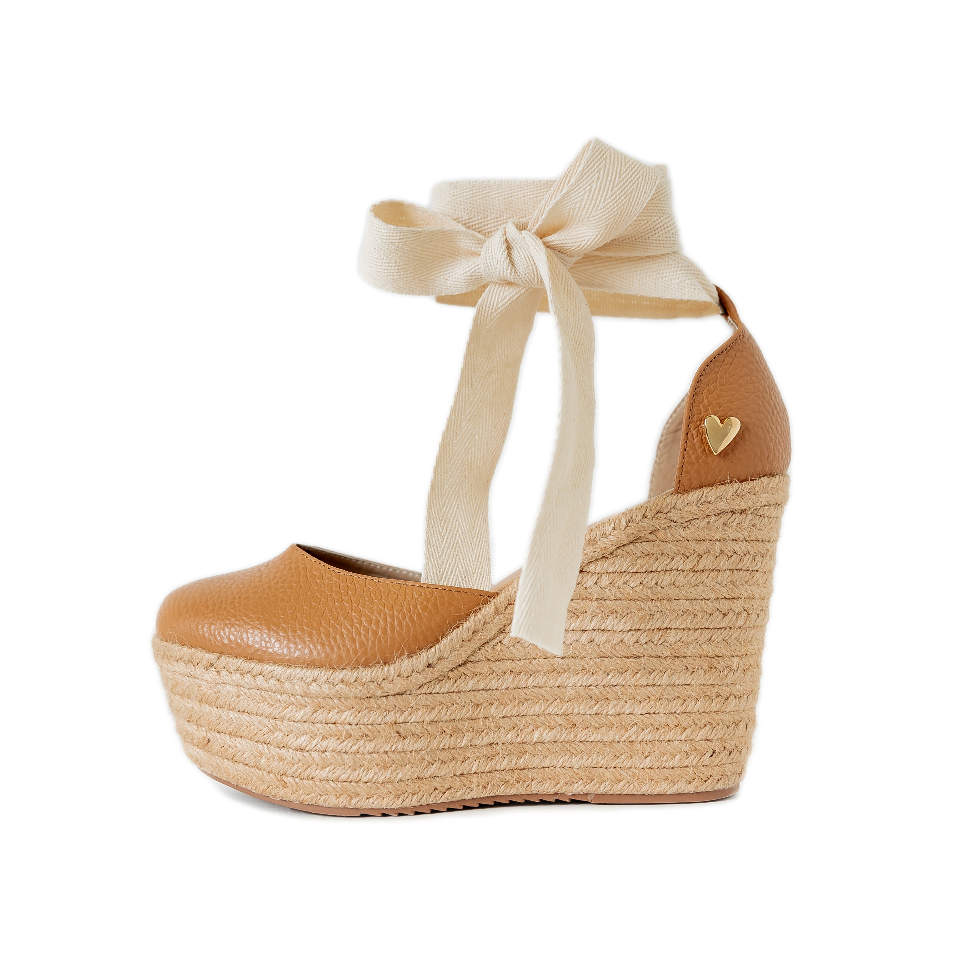 Camel Leather Espadrilles - Dual by Nataly Mendez Natural jute base Genuine leather upper Genuine leather insole. 100% made in Colombia! 4 inch heel height 1.75 inch platform Comes with strap closure and beige hiladilla laces.