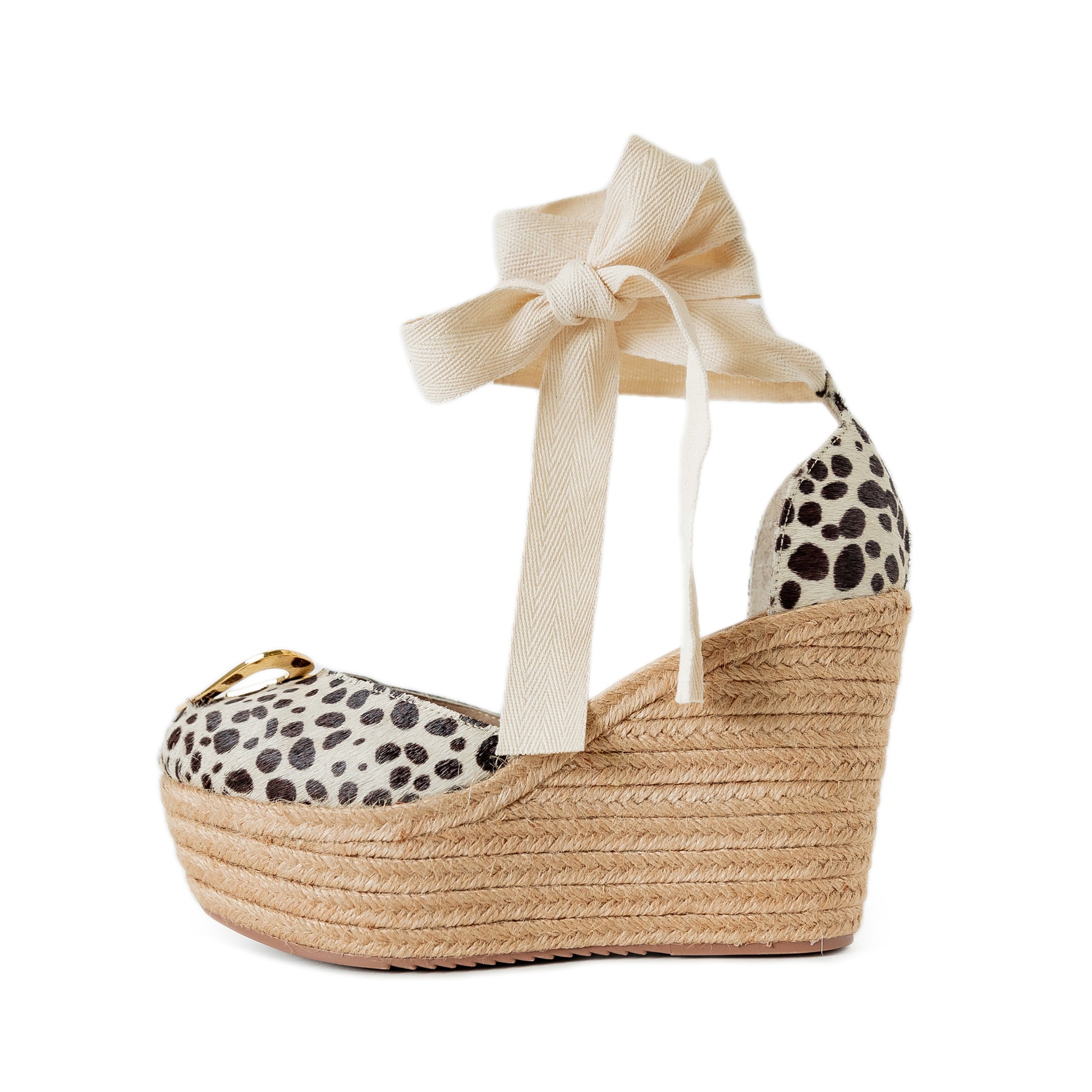 Love Leopard by Nataly Mendez Natural jute base Genuine leather upper Genuine leather insole. 100% made in Colombia! 4 inch heel height 1.75 inch platform Comes with strap closure and beige hiladilla laces.