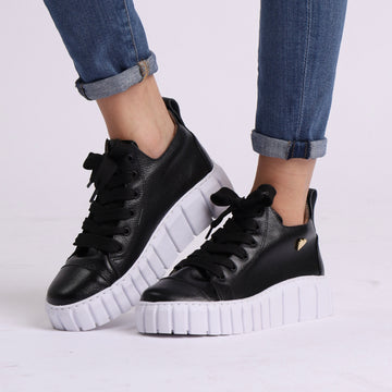 Lucie Sneakers Black by Nataly Mendez. Genuine leather upper material Genuine leather insole lining Rubber platform lining American sizes Flexible rubber sole Handcrafted 1.5 inch heel height 1 inch platform