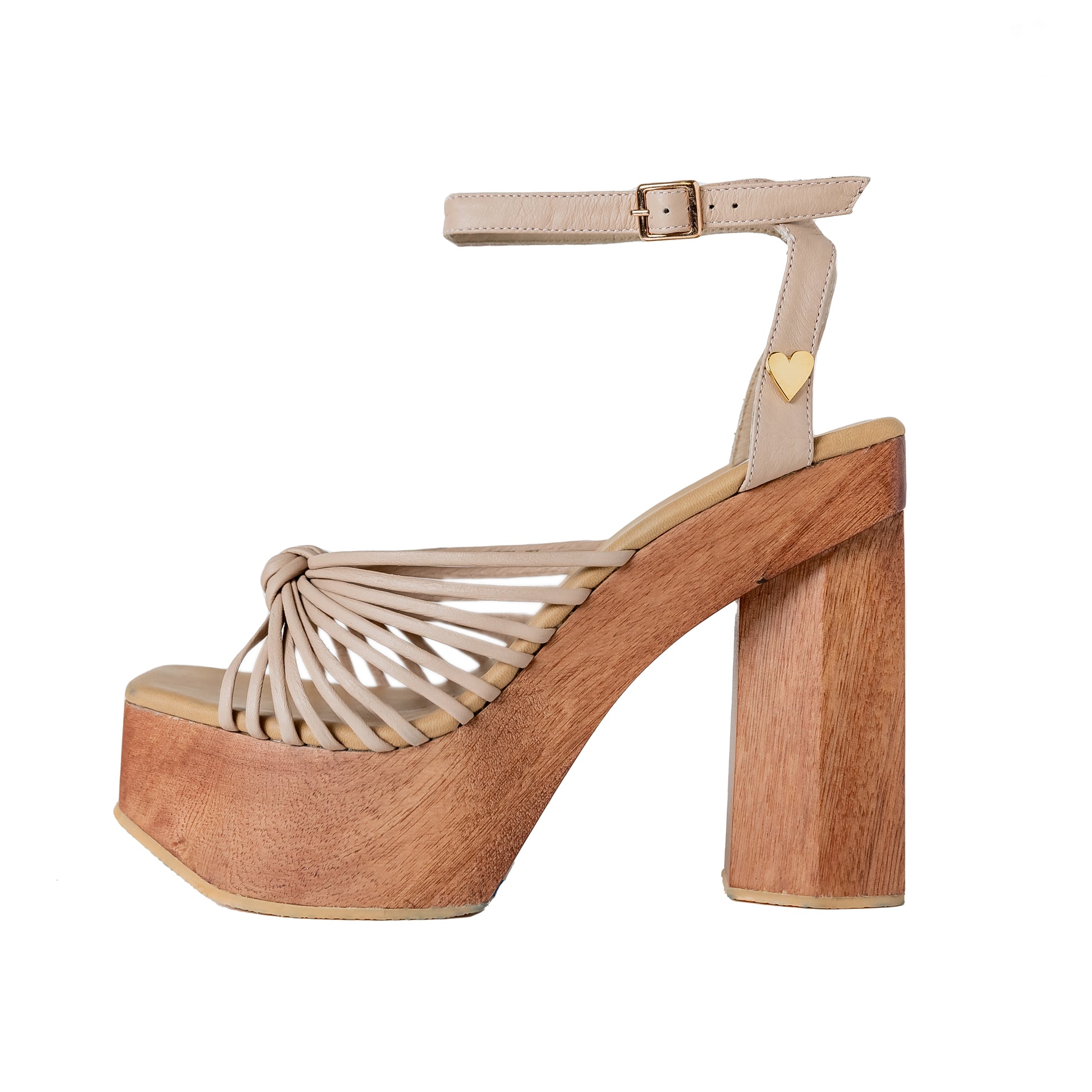 Sandal Stella by Nataly Mendez. Its upper material, lining, and insole are made of genuine leather. Its 5-inch heel height and 1.75-inch platform.
